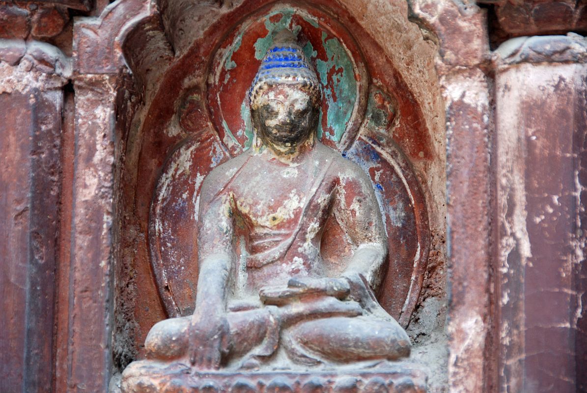 Kathmandu Patan 06 Mahabouddha Temple 02 Buddha Sculpture Every brick of the Mahabouddha Temple in Patan has an image of the Buddha.
